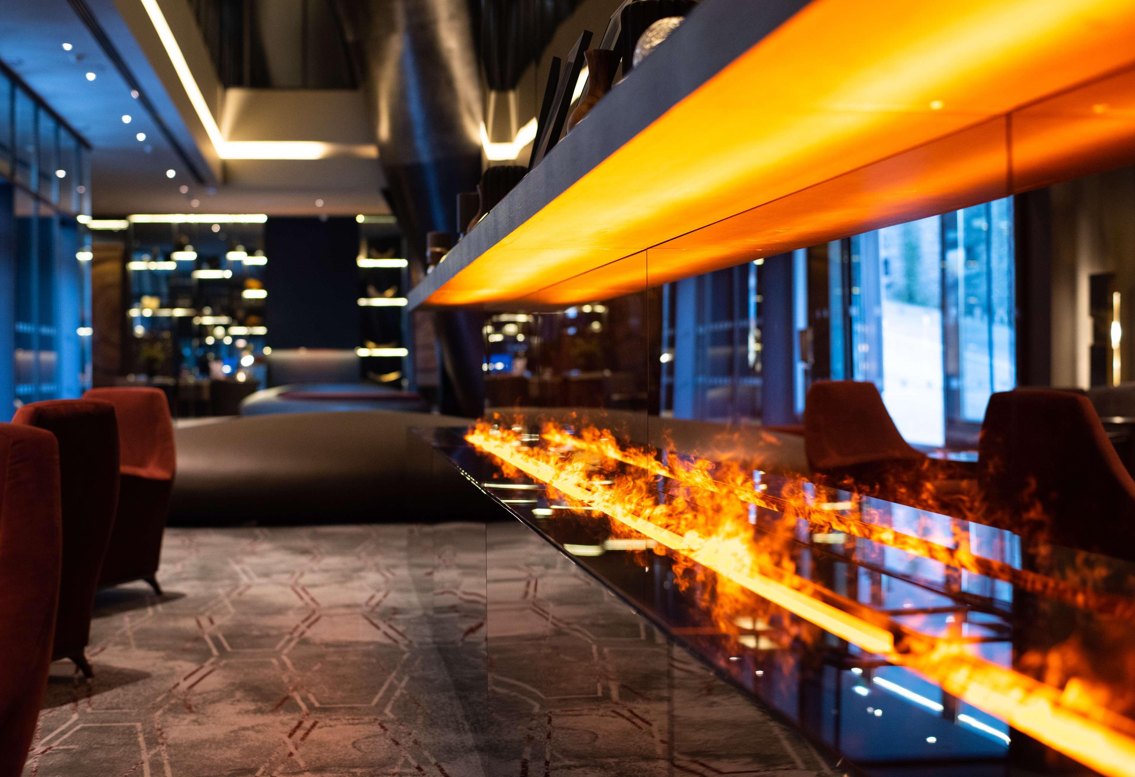 Hilton Porto Gaia Hotel Vila Nova de Gaia Exterior photo The fireplace at the lobby